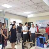 河东戋戋委书记李建成等向导冒雨到访金狮贵宾会智慧养老考察